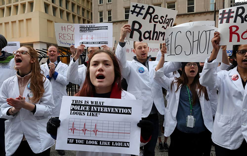Dozens of medical students from various Chicago student associations protest at Daley Plaza, to protest the killing of Laquan McDonald by a police officer in Chicago.