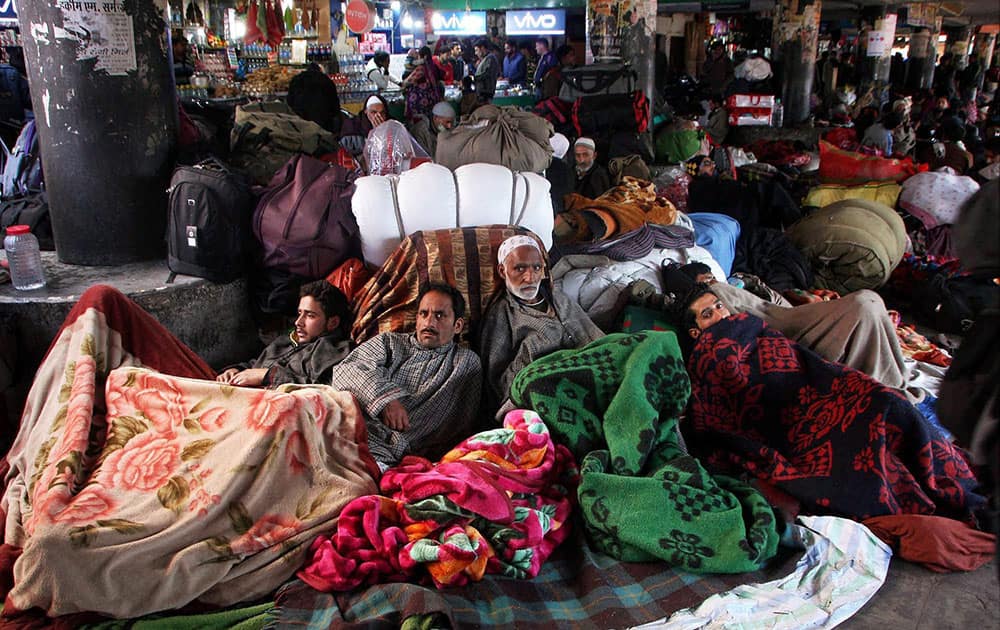 Stranded passengers at a bus station