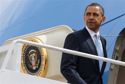 President Barack Obama boards Air Force One at Andrews Air Force Base, Md., as he travels to the U.S.-Mexico border at El Paso, Texas, to speak about immigration reform.