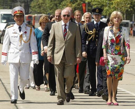 General Nguyen Van Cuong  leads the way for Australia`s Governor General Quentin Bryce and her husband Michael to a wreath-laying ceremony at the mausoleum of the Vietnamese late revolutionary leader Ho Chi Minh in Hanoi. Governor General Bryce is in Hanoi with her husband for a visit to Vietnam from May 8 to 14.