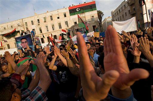 Libyan protesters chant slogans against Moammar Gadhafi during a demonstration in Benghazi.