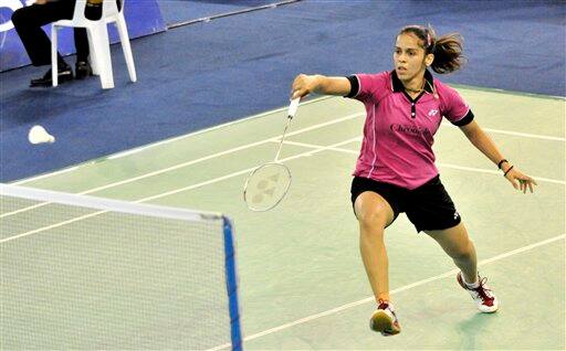 In this photo provided by China`s Xinhua News Agency, India`s Saina Nehwal returns the shuttle cock during the women`s singles semi-final match against South Korea`s Sung Ji Hyun at Malaysia Open Grand Prix Gold 2011 in Kedah, Malaysia. Saina Nehwal won 2-0 and qualified to the final. 