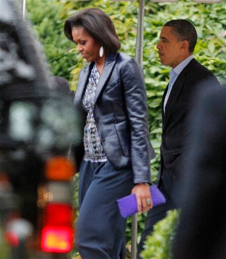 President Barack Obama and first lady Michelle Obama leave the White House in Washington.