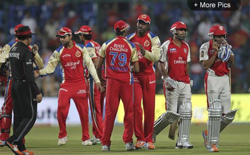 Royal Challengers Bangalore player Chris Gayle celebrate the victory over Kings XI Punjab in their Indian Premier League (IPL) cricket match in Bangalore.