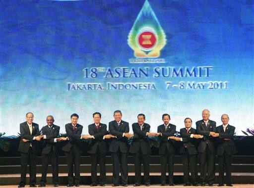 Heads of states and governments of the Association of Southeast Asia Nations, from left, Philippine President Benigno Aquino III, Singaporean Senior Minister S. Jayakumar, Thai Prime Minister Abhisit Vejjajiva, Vietnamese Prime Minister Nguyen Tan Dung, Indonesian President Susilo Bambang Yudhoyono, Cambodian Prime Minister Hun Sen, Brunei`s Sultan Hassanal Bolkiah, Lao Thongsing Thammavong, Malaysian Prime Minister Najib Razak and Myanmar`s President Thein Sein pose for a group shot during the opening ceremony of the 18th ASEAN Summit in Jakarta, Indonesia.