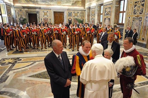 Pope Benedict XVI meets new Vatican Swiss Guards and their families , in the Vatican`s Clementina Hall, prior to their swearing-in ceremony. The swearing in ceremony is held each May 6 to commemorate the day in 1527 when 147 Swiss Guards died protecting Pope Clement VII during the Sack of Rome.