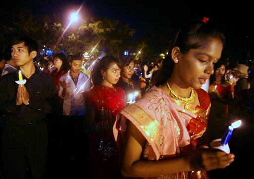 Indonesian Buddhists pray during a ceremony welcoming the holy month of Vesak in Medan, North Sumatra, Indonesia. Vesak is the most important month in Buddhist calendar as it marks the birth, enlightenment and demise of Buddha.