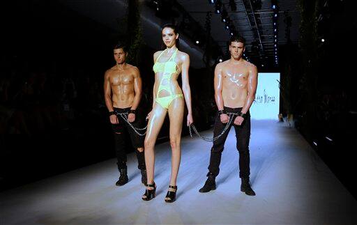 Models wear the fashions of designer Lisa Maree during Australian Fashion Week in Sydney.