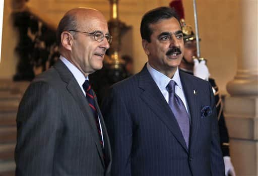 Pakistani Prime Minister Yousuf Raza Gilani, right, meets with French Foreign Minister Alain Juppe, left, in Paris. The Pakistani Prime Minister is visiting France one day after a U.S. military raid on a secure compound in Abbottabad, Pakistan, late Monday ended in the death of fugitive al-Qaida leader Osama bin Laden and others inside the compound. 