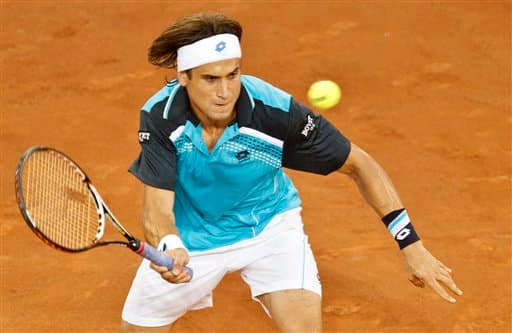 Spain`s David Ferrer returns a ball to France`s Adrian Mannarino during their Madrid Open tennis tournament match in Madrid.