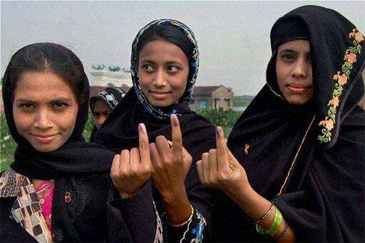 Muslim women cast their votes during the fourth phase of West Bengal Assembly elections in Howrah.