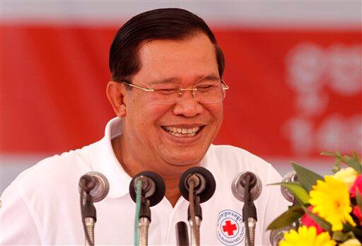 Cambodian Prime Minister Hun Sen smiles while he gives a speech during ceremonies held ahead of the May 8 World Red Cross Day and Red Crescent Day in Phnom Penh, Cambodia.