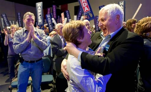 Conservative supporters celebrate as they watch election results come in, in Calgary, Alberta, Canada.