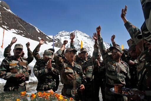 Indian army officers shout slogans during the reopening of Zojila Pass, about 108 kilometers (67 miles) north of Srinagar, India.