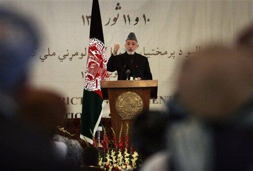 Afghan President Hamid Karzai speaks during a district assembly gathering at the presidential palace in Kabul. Afghanistan`s president lauded Osama bin Laden`s death as a serious blow to terrorism Monday and argued that the strike in Pakistan proves the real fight against terrorists is outside his country`s borders. 