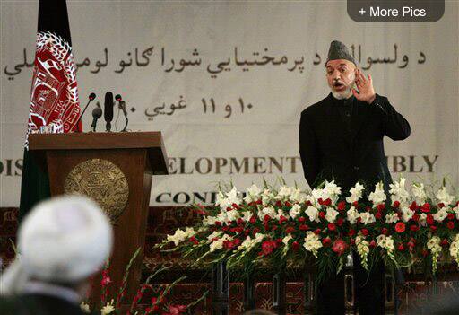 Afghan President Hamid Karzai listens to the speech of a participant during a district assembly gathering at the presidential palace in Kabul. Afghanistan`s president lauded Osama bin Laden`s death as a serious blow to terrorism Monday and argued that the strike in Pakistan proves the real fight against terrorists is outside his country`s borders.