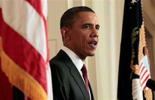 President Barack Obama reads his statement to photographers after making a televised statement on the death of Osama bin Laden from the East Room of the White House in Washington.