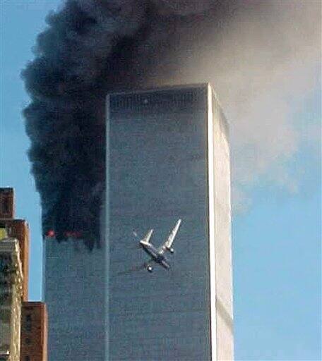 FILE - In this Sept. 11, 2001 file photo, a jet airliner is lined up on one of the World Trade Center towers in New York. A person familiar with developments said Sunday, May 1, 2011 that Osama bin Laden is dead and the U.S. has the body.