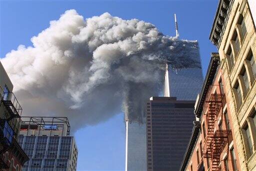 FILE - In this Sept. 11, 2001 file photo, a jet airliner is lined up on one of the World Trade Center towers in New York. A person familiar with developments said Sunday, May 1, 2011 that Osama bin Laden is dead and the U.S. has the body.