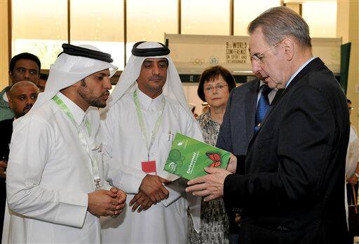 The Qatar Olympic Committee, President of the International Olympic Committee (IOC) Jacques Rogge, right, and General Secretary of Qatar`s Olympic Committee Sheik Saud bin Abdul Rahman, left, visit the Green Technology Exhibition at the 9th World Conference on Sport and the Environment in Doha, Qatar. IOC President Jacques Rogge says environmental sustainability remains a key part of the Olympic movement and will continue to be through the 2012 and 2016 games. 