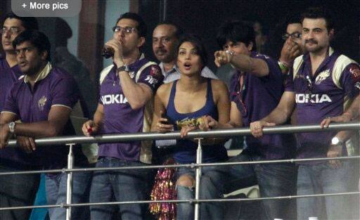 Bollywood actor and Kolkata Night Riders owner Shah Rukh Khan , front second right, and Bollywood actress Priyanka Chopra cheer for their team during the Indian Premier League cricket match between Kolkata Knight Riders and Kings XI Punjab in Kolkata.