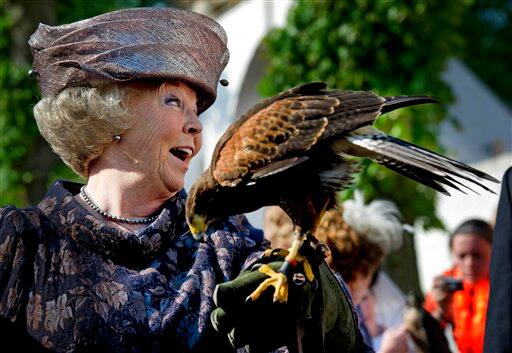 Netherlands` Queen Beatrix reacts during festivities marking Queen`s Day in Thorn, southern Netherlands, Saturday April 30, 2011. The Dutch celebrate Queen`s Day, a Dutch national holiday marking the birthday of the Queen`s mother. 