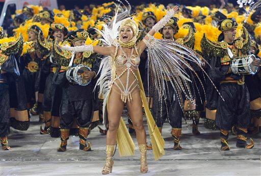 Comedian Sabrina Sato performs during the parade of Gavioes da Fiel samba school in Sao Paulo, Brazil.