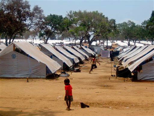 New York, children are seen outside tents at a displacement camp in Vavuniya, Sri Lanka.