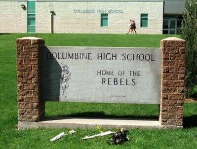 On registration day at Columbine High School flowers still lie in memoriam for the 12 students and one teacher shot and killed April 20, 1999 on the Columbine High School campus grounds in Littleton, Colorado in this August 9, 1999 file photo.
