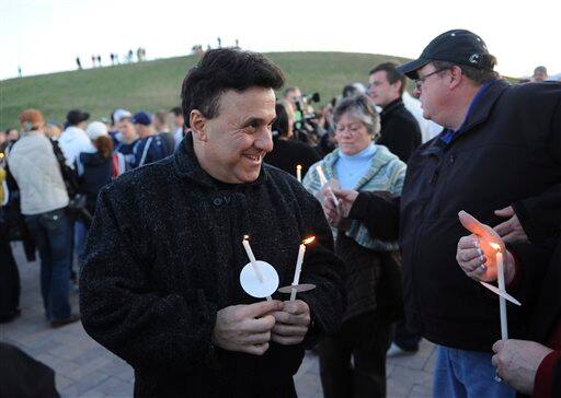 Columbine High School Principal Frank DeAngelis attends a candlelight vigil at the Columbine Memorial at Clement Park near Littleton, Colo., on Sunday, April 19, 2009. DeAngelis was the principal at the time of the attack.