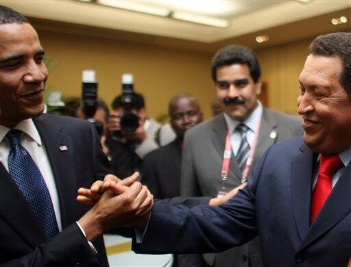 In this photo released by Miraflores Press Office, Venezuela`s President Hugo Chavez, right, shakes hands with President Barack Obama at the Summit of the Americas in Port-of-Spain, Trinidad and Tobago, Friday, April 17, 2009. 