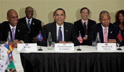 President Barack Obama, center, meets with Belize`s Prime Minister Dean Barrow, left, and Trinidad and Tobago`s Prime Minister Patrick Manning during a multilateral meeting at the 5th Summit of the Americas on Friday, April 17, 2009 in Port-of-Spain, Trinidad and Tobago.