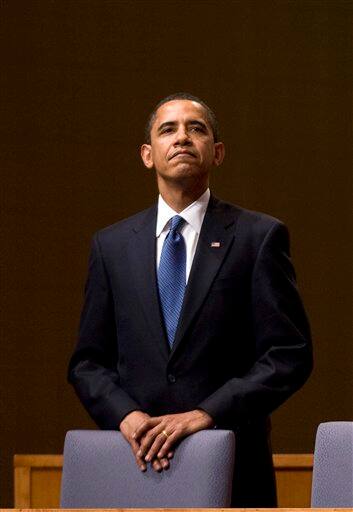 President Barack Obama pauses during the opening ceremony of the Summit of the Americas on Friday, April 17, 2009 in Port-of-Spain, Trinidad and Tobago.