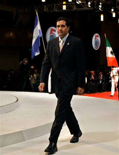 Panama`s President Martin Torrijos enters during the opening ceremony of the 5th Summit of the Americas in Port of Spain, Trinidad and Tobago, Friday April 17, 2009.