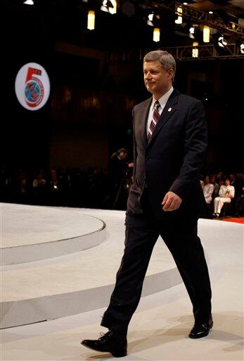 Canada`s Prime Minister Stephen Harper enters during the opening session of the 5th Summit of the Americas in Port of Spain, Trinidad and Tobago, Friday April 17, 2009.