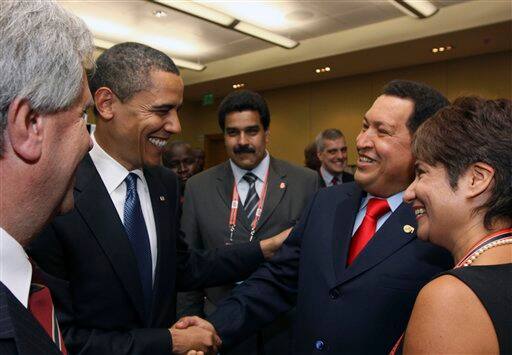 President Barack Obama, left, shakes hands with Venezuela`s President Higo Chavez during the 5th Summit of the Americas in Port of Spain, Trinidad and Tobago, Friday April 17, 2009.