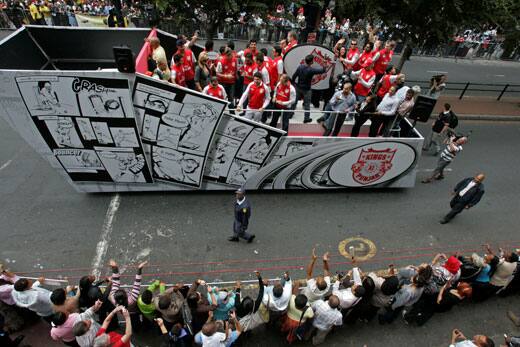 Kings Punjab cricket team members drive past during a parade through the streets of Cape Town, ahead of the Indian Premier League Twenty20 cricket matches to be held over the weekend in Cape Town