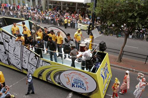 The Chennai Super Kings cricket team drives past during a parade through the streets of Cape Town, ahead of the Indian Premier League Twenty20 cricket matches to be held over the weekend in Cape Town