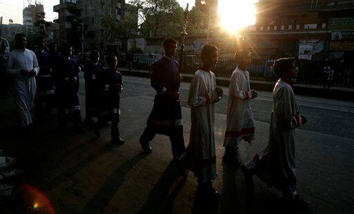 Christian devotees participate in a Good Friday procession in Calcutta