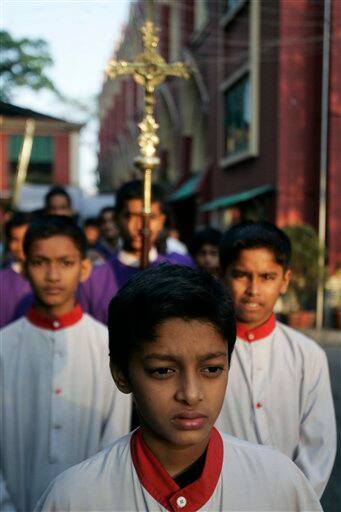 Christian devotees participate in a Good Friday procession in Calcutta