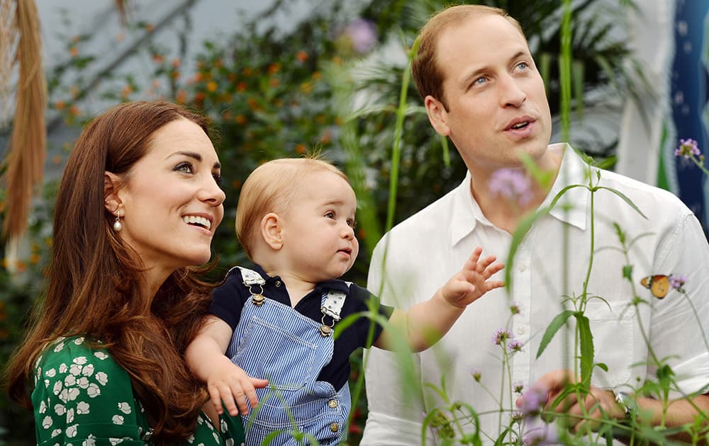 Britain`s Prince William and Kate Duchess of Cambridge and the Prince during a visit to the Sensational Butterflies exhibition at the Natural History Museum, London.