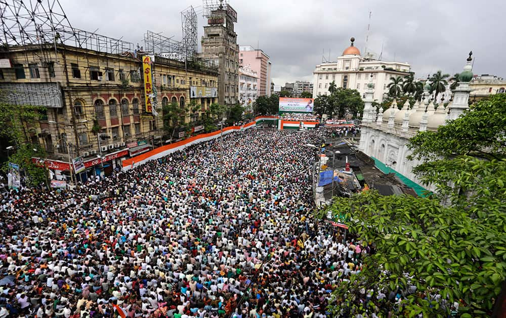 Indian West Bengal state’s Trinamool Congress party (TMC) supporters gather as they observe Martyrs` Day in Kolkata, India.