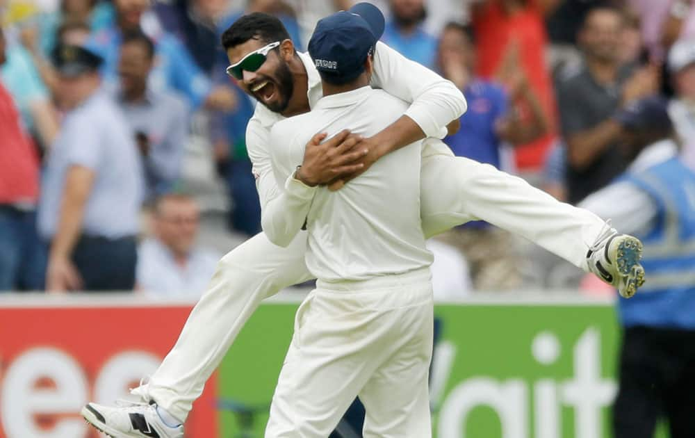 India`s Ravindra Jadeja is held up by a teammate as he celebrates after running out England`s James Anderson to win the test match on the fifth day of the second cricket test match between England and India at Lord`s cricket ground in London. India won the match by 95 runs. The International Cricket Commission (ICC) has set next Tuesday as the date for a disciplinary hearing against James Anderson for shoving India`s Ravindra Jadeja during the first test. 