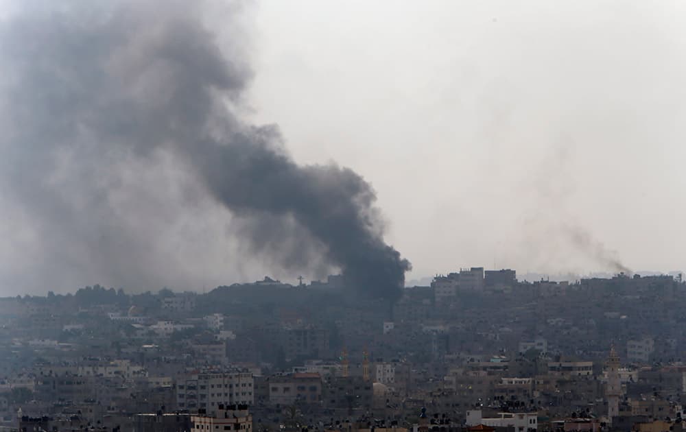 Smoke from Israeli strikes rises over Gaza City , northern Gaza Strip.