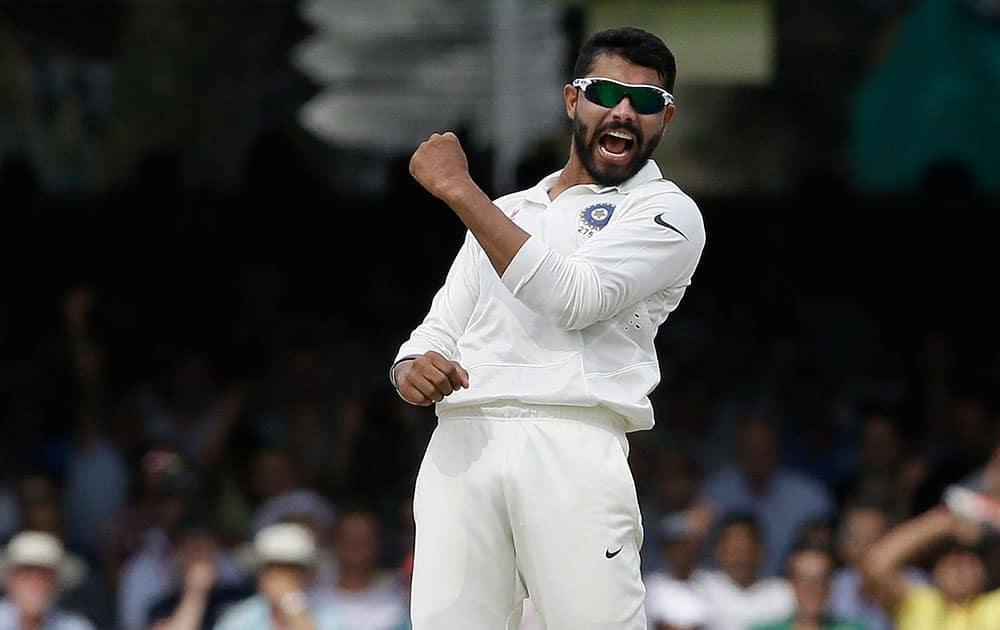 India`s Ravindra Jadeja celebrates the wicket of England`s Sam Robson during the fourth day of the second test match between England and India at Lord`s cricket ground in London.