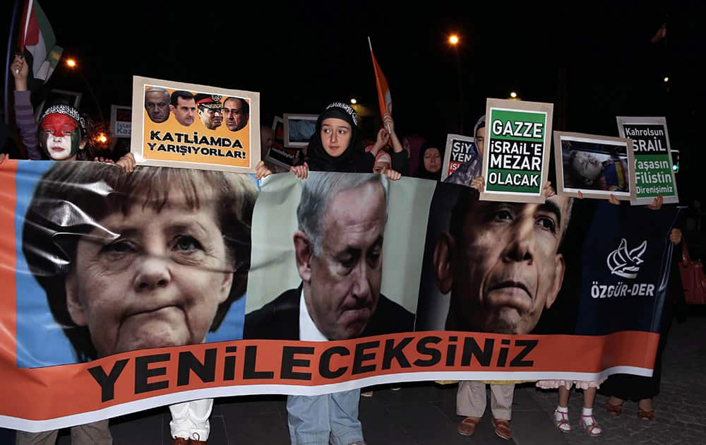 Pro-Palestinian Turks stage a protest rally against Israel`s ground operation in Gaza Strip, outside the US embassy in Ankara, Turkey.