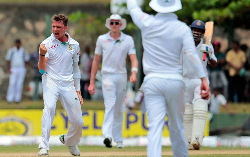 South Africa`s Dale Steyn celebrates after taking the wicket of Sri Lanka`s Mahela Jayawardene in the third day of the first test cricket match between them in Galle, Sri Lanka.