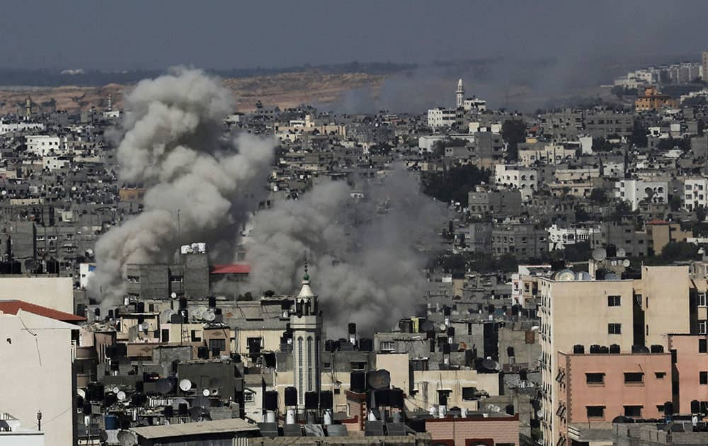 Smoke rises after Israeli missile strikes hit the northern Gaza Strip.