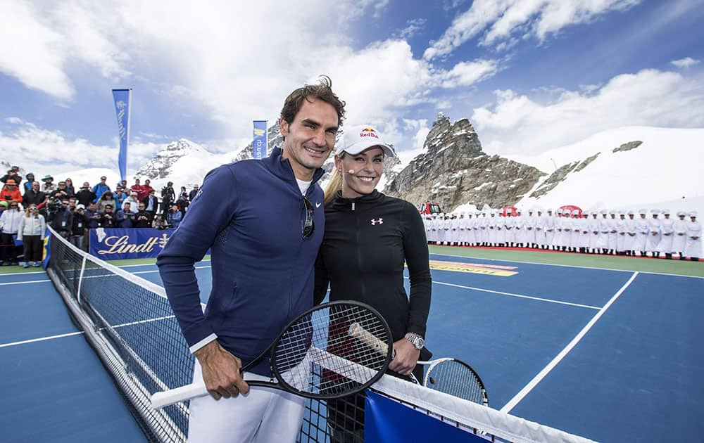 Switzerland’s champion tennis player Roger Federer and US champion ski racer Lindsey Vonn played an exhibition tennis match on the Aletsch Glacier below the Sphinx Summit to celebrate the opening of the LINDT Swiss Chocolate Heaven, a shop at 3,454 metres above sea level on Jungfraujoch, Switzerland.