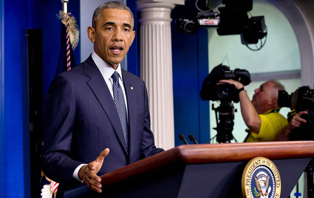 President Barack Obama speaks about foreign policy and escalating sanctions against Russia in response to the crisis in Ukraine in the James Brady Press Briefing Room at the White House in Washingon.